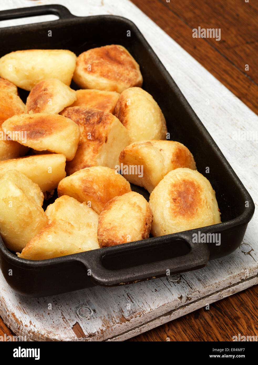 Pan filled with roast potato Stock Photo