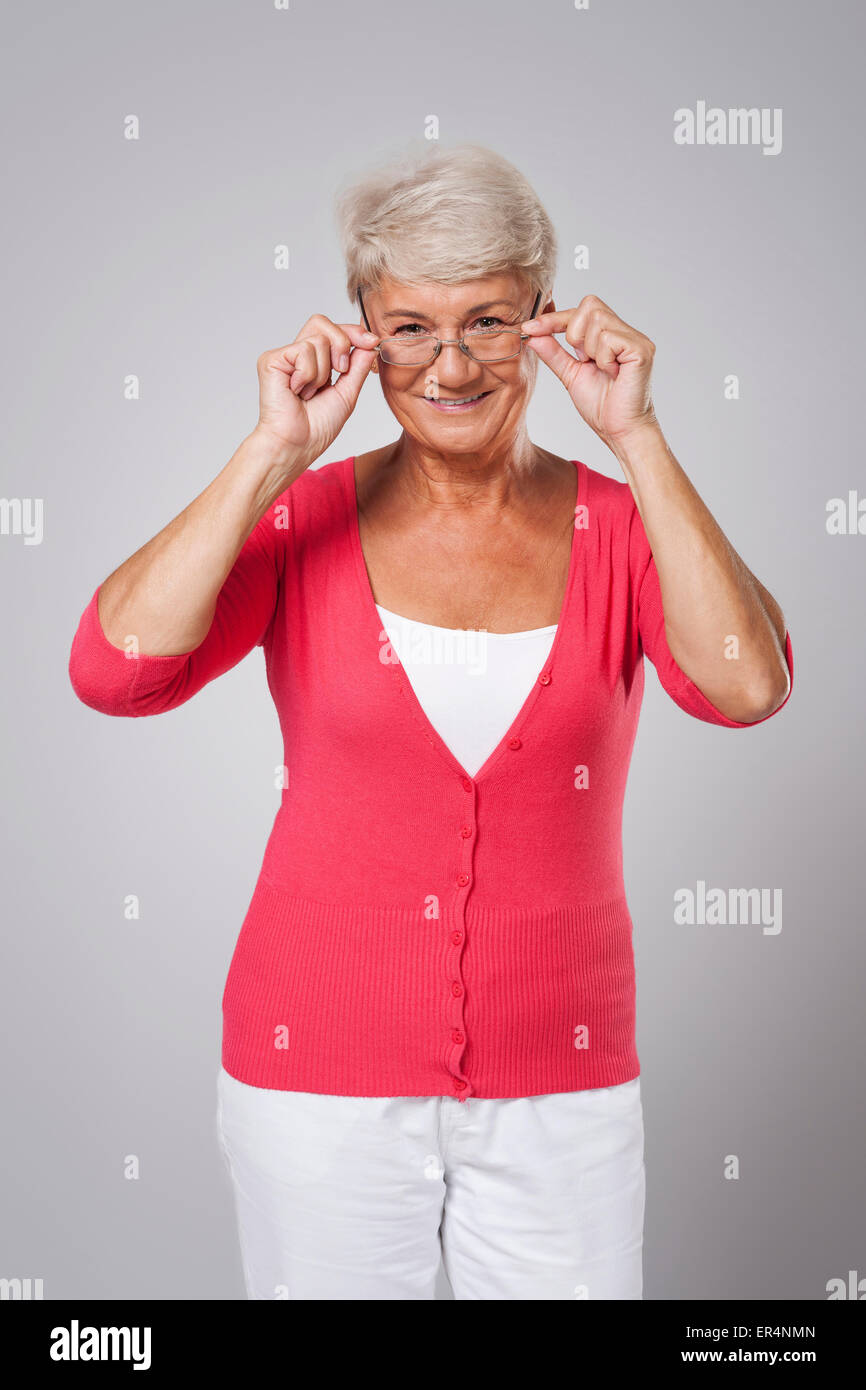 Older lady with reading glasses Stock Photo