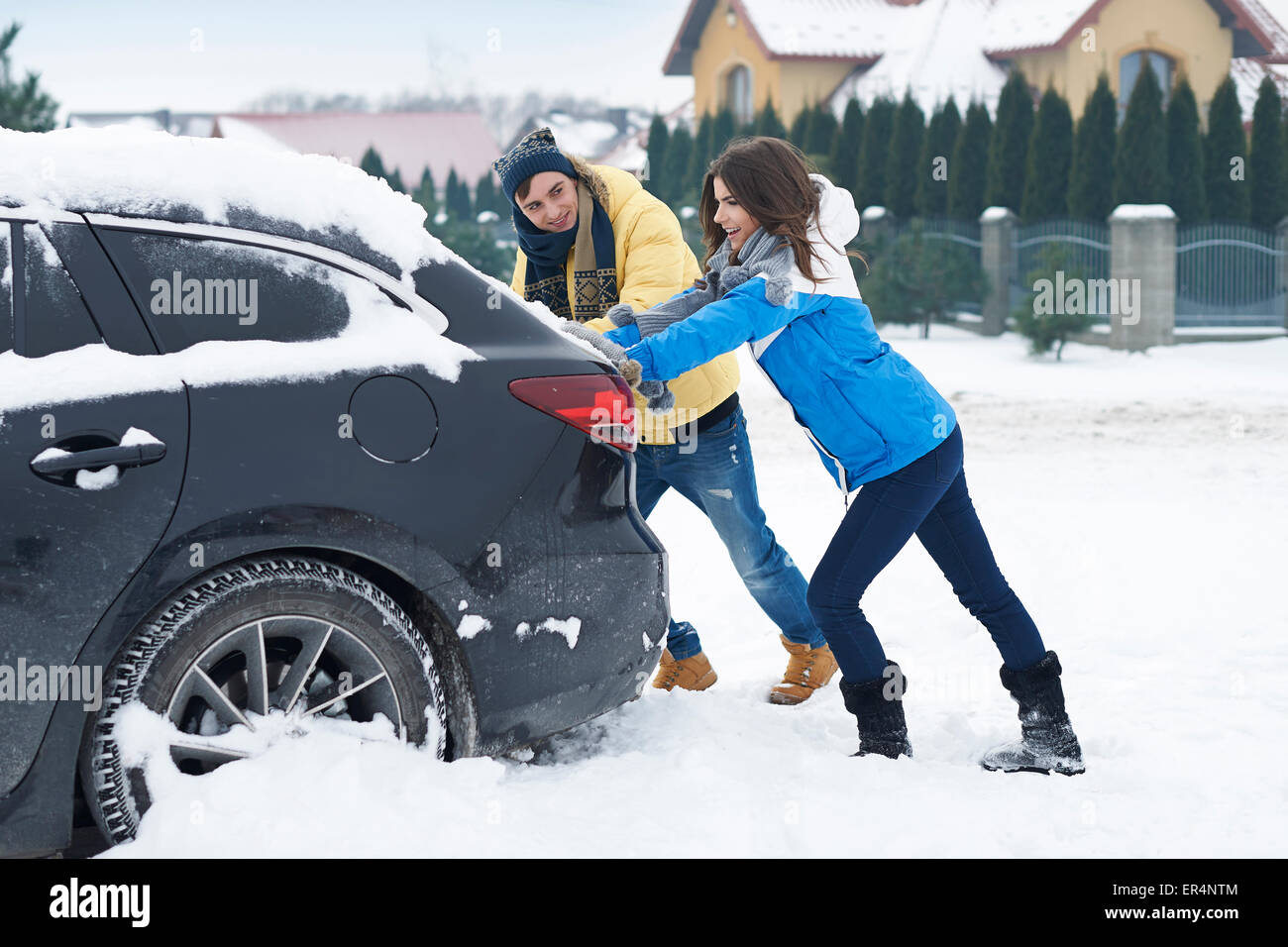 Stuck car in snowdrift is big problem for us. Debica, Poland Stock Photo