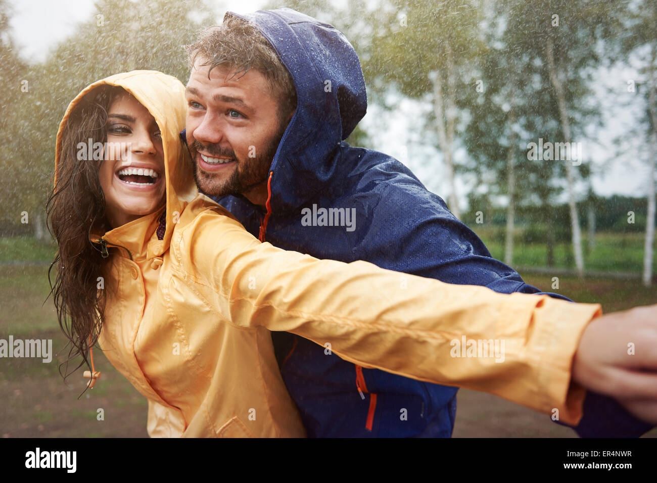 Romantic love in the pouring rain. Debica, Poland Stock Photo