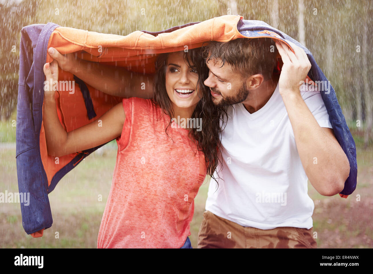 Oh baby, I have to protect you from the rain. Debica, Poland Stock Photo