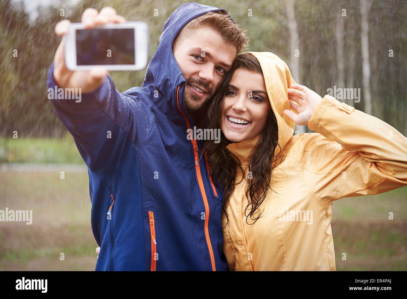 Let's taking selfie in this rainy day. Debica, Poland Stock Photo