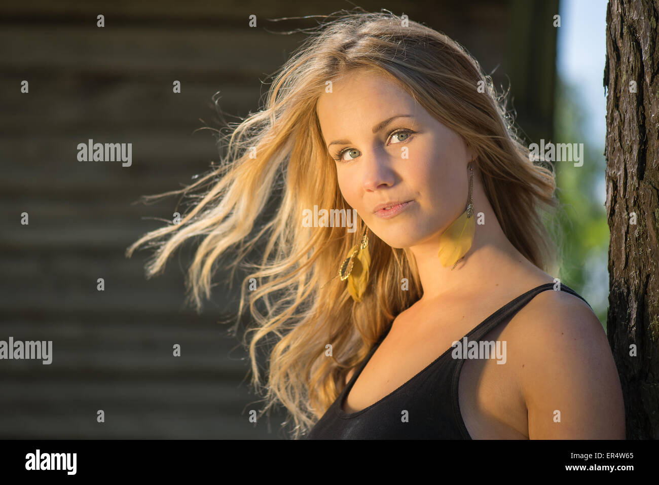 Beautiful blond woman in countryside Stock Photo