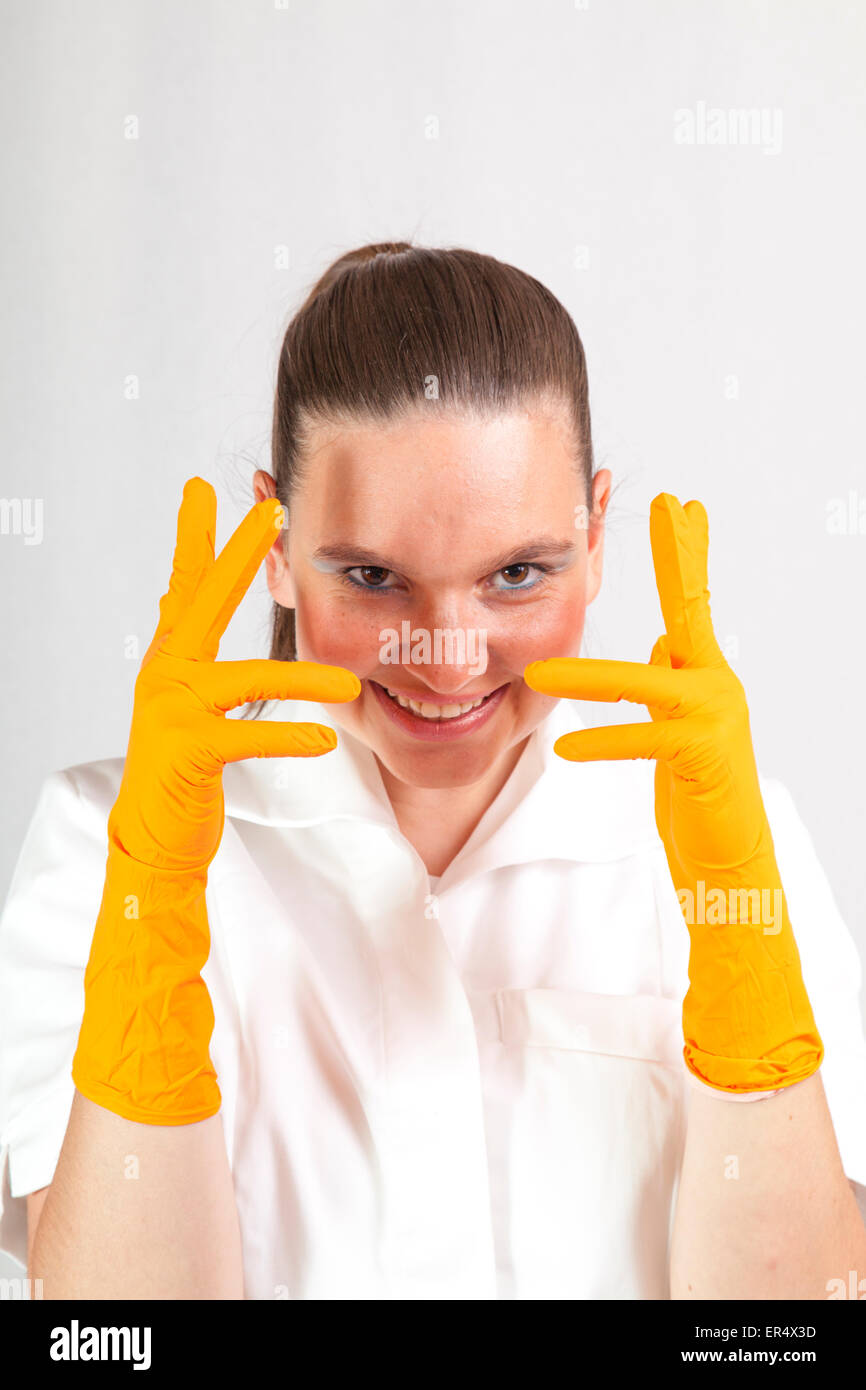 Female doctor surgeon or chemist wearing latex gloves Stock Photo