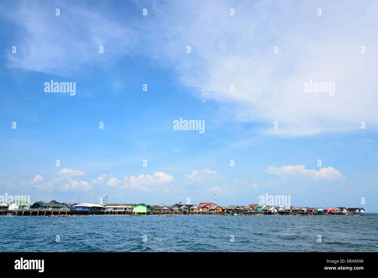 Blue sky background above fisherman village on the sea at Koh Panyee or Punyi island cultural attractions travel by boat in Phan Stock Photo