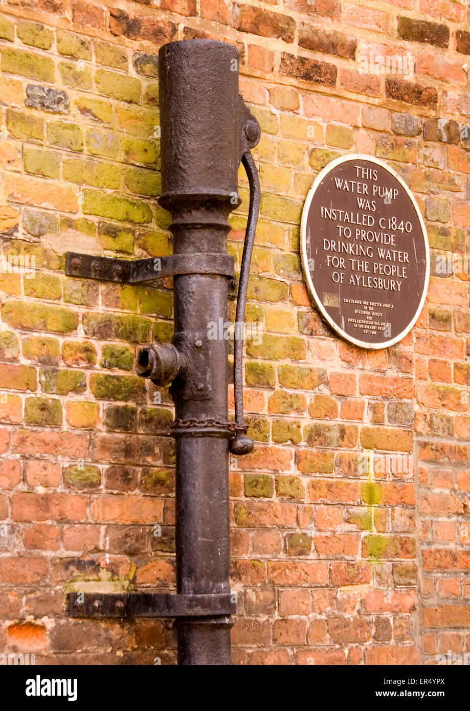 Bucks - Aylesbury town - social history - drinking water pump - set up in 1840 - ironwork - information plaque Stock Photo