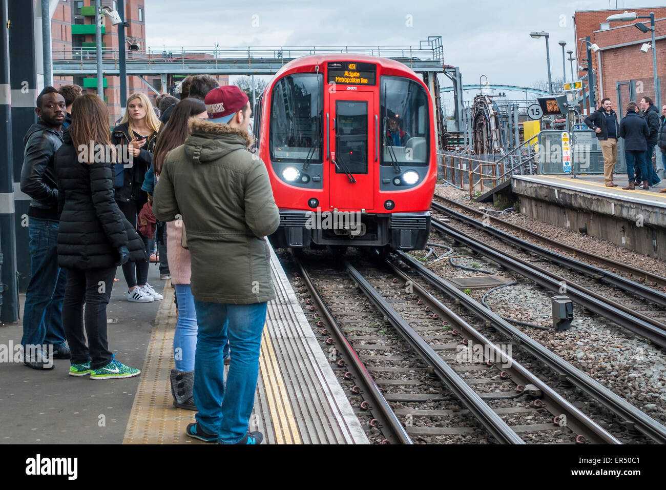 Tube Underground Train Entering Station London Stock Photo