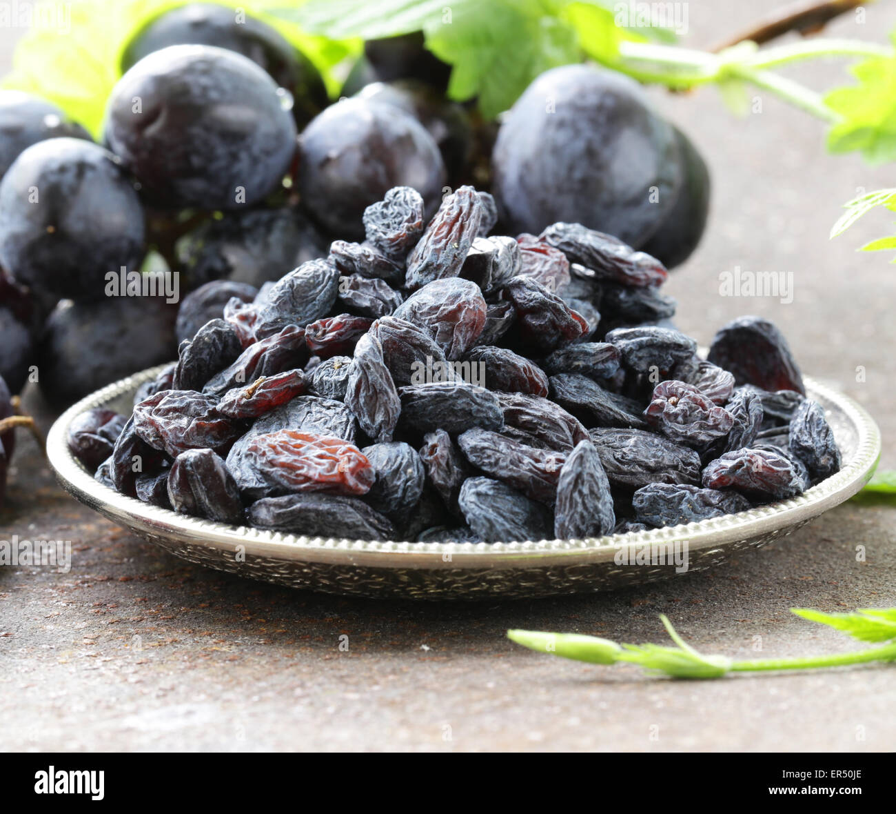 Natural organic dried grapes raisins, rustic still life Stock Photo Alamy