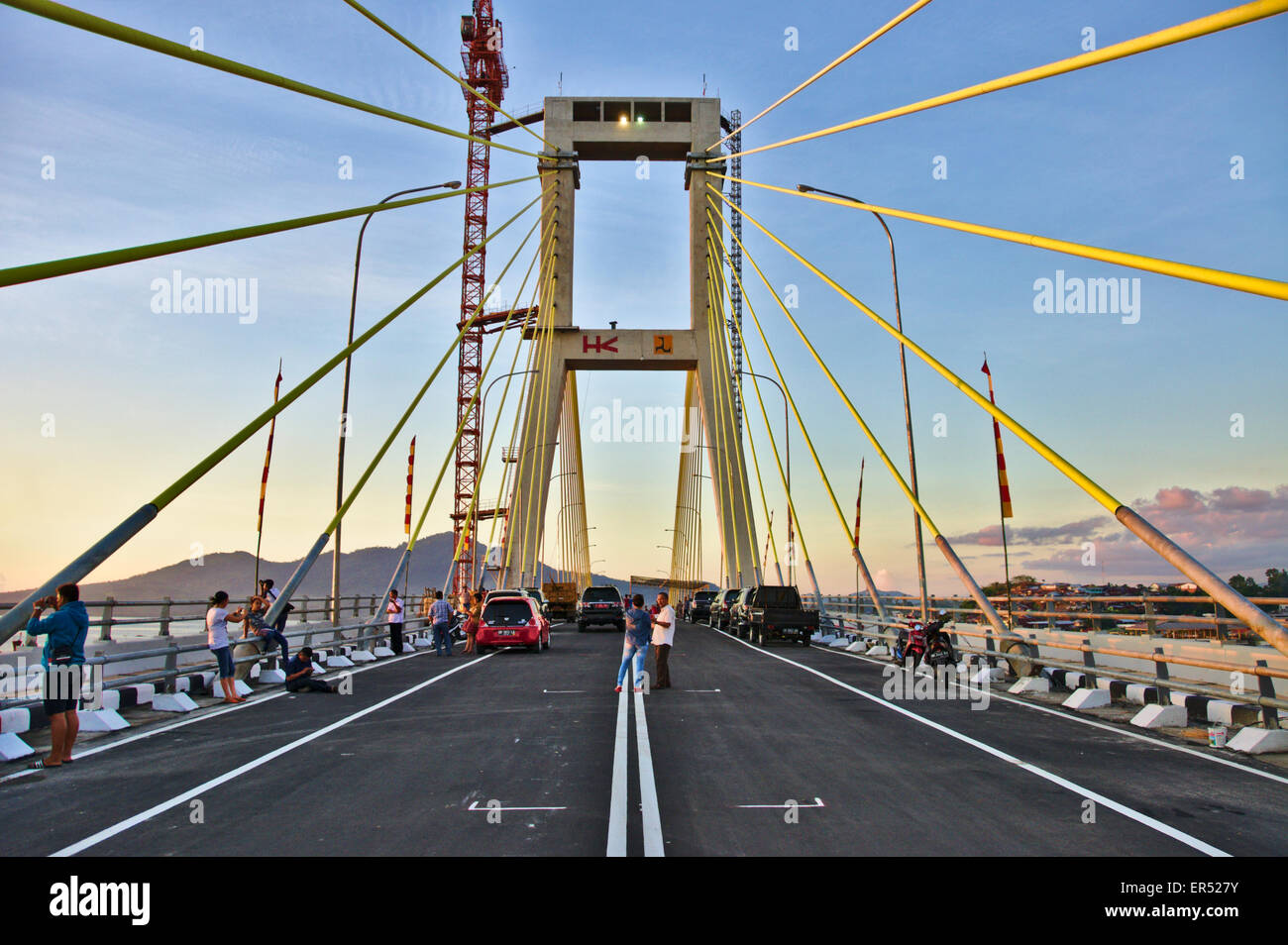 Manado, Indonesia. 27th May, 2015. The Sukarno Bridge over the harbor in Manado, North Sulawesi, Indonesia on Wednesday May the 27, 2015 the day before President Joko Widodo is scheduled to officiate its opening after 12 years of construction. Credit:  Kejar Terang/Alamy Live News Stock Photo