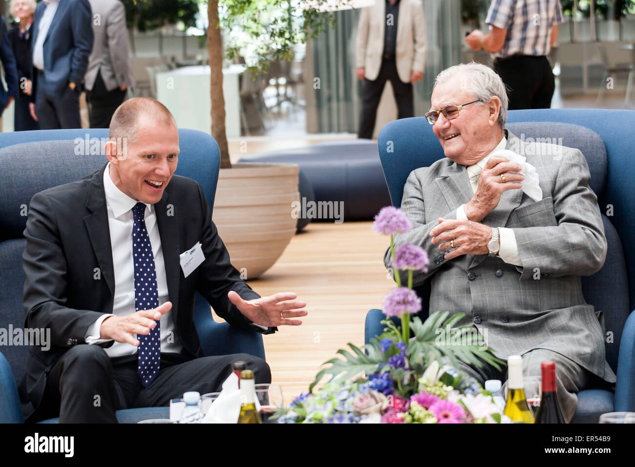 Hedehusene, Denmark, May 27th, 2015: Prince Concort Henrik (R) and DSV’s CEO, Mr. Jens Bjorn Andersen talks at the reception hall at DSv’s head quarter in Hedehusene. The Prince Concort has just unveiled his new sculpture, “The Creative Hand” in front of DSV’s entrance Credit:  OJPHOTOS/Alamy Live News Stock Photo