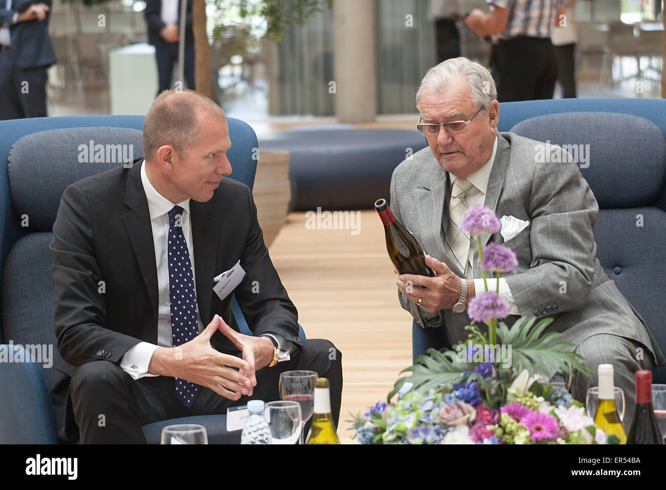 Hedehusene, Denmark, May 27th, 2015: Prince Concort Henrik (R) and DSV’s CEO, Mr. Jens Bjorn Andersen talks at the reception hall at DSv’s head quarter in Hedehusene. The Prince Concort has just unveiled his new sculpture, “The Creative Hand” in front of DSV’s entrance Credit:  OJPHOTOS/Alamy Live News Stock Photo