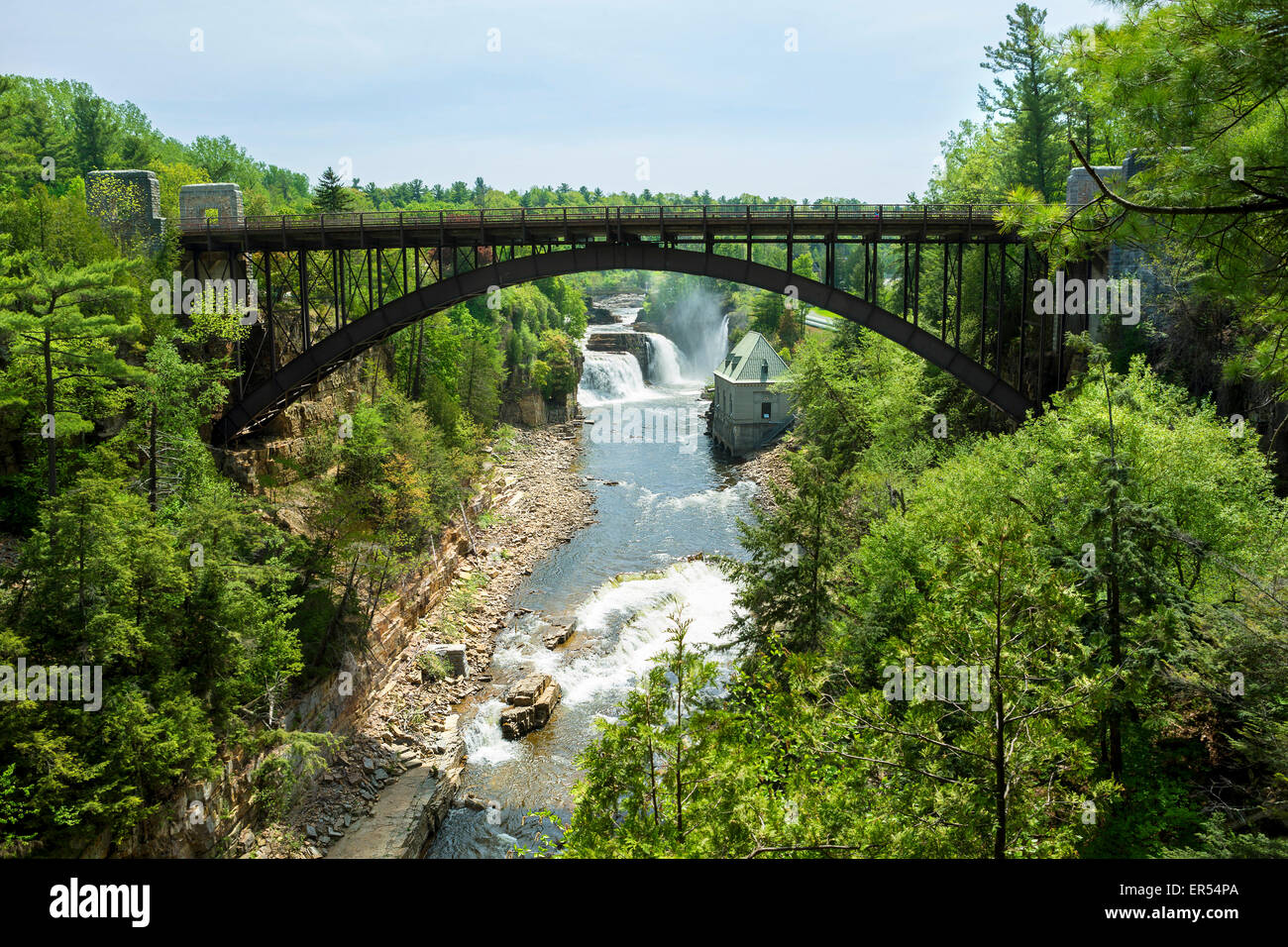 Scenic view of Rainbow Falls and of the Arch Bridge in Ausable Chasm, town of Keeseville in Upstate New York. Stock Photo