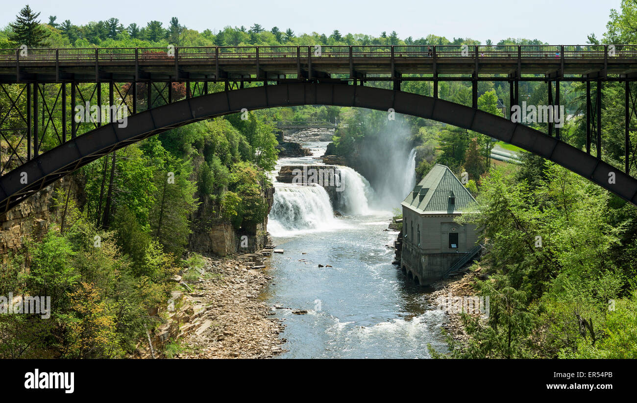 Scenic view of Rainbow Falls and of the suspended Arch Bridge in Ausable Chasm, town of Keeseville in Upstate New York. Stock Photo