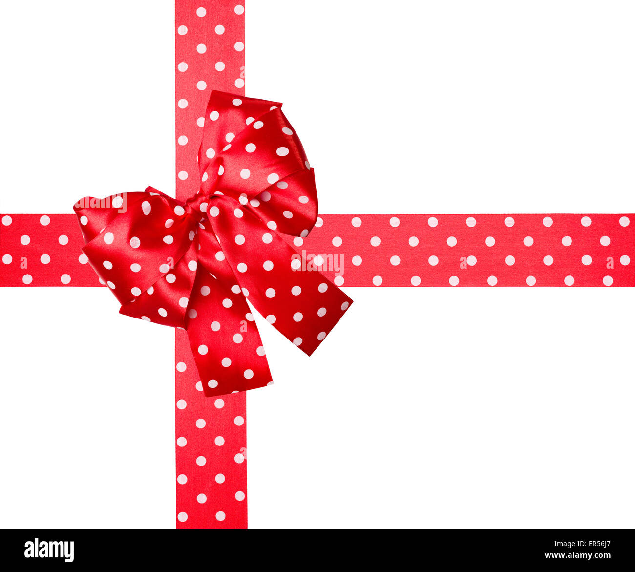 red bow and ribbon with white polka dots made from silk isolated Stock ...