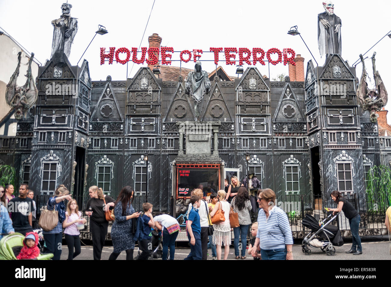 Pinner, London, UK. 27 May 2015. A House of Terror ride awaits, as hundreds of people gather in