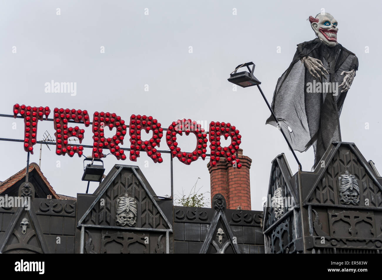 Pinner, London, UK. 27 May 2015. A House of Terror ride awaits, as