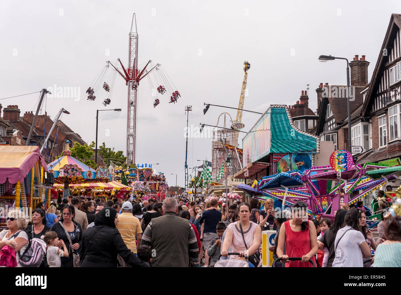 Pinner, London, UK.  27 May 2015.  Hundreds of people gather in Pinner, north-west London, for Pinner fair.  The town has had an annual street fair held in May since 1336, when it was granted by Royal Charter.  It remains popular with schoolchildren and families during the half-term holiday, on the first Wednesday following Whitsunday. Credit:  Stephen Chung / Alamy Live News Stock Photo