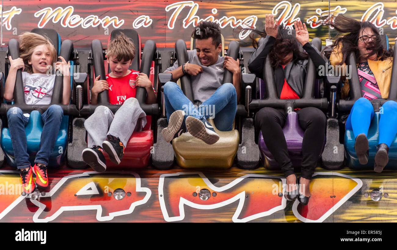 Pinner, London, UK. 27 May 2015. Children enjoy the Miami Trip ride