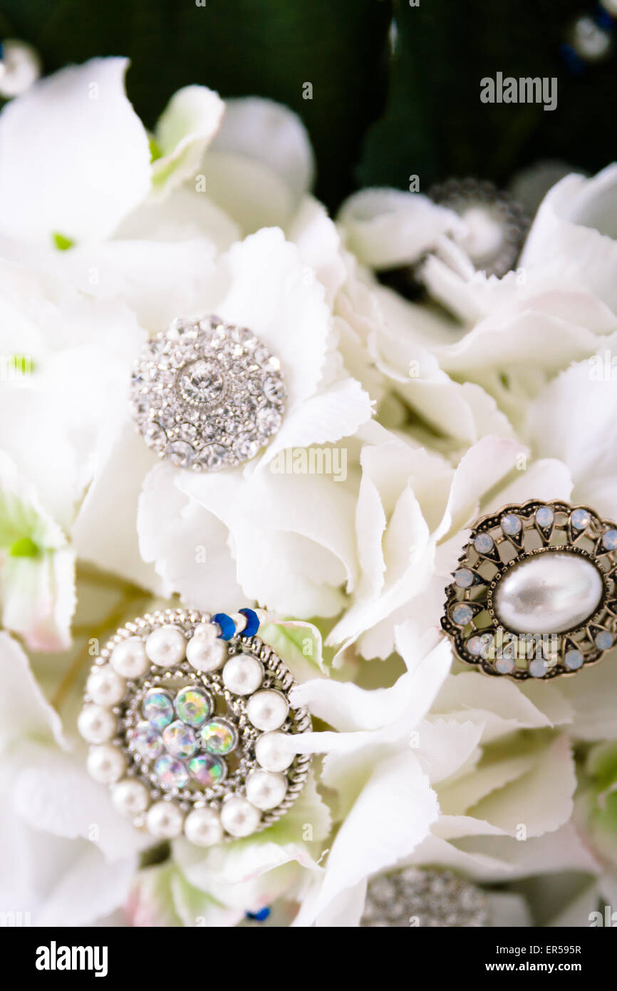 CLose up of artificial white flowers with jewels Stock Photo Alamy