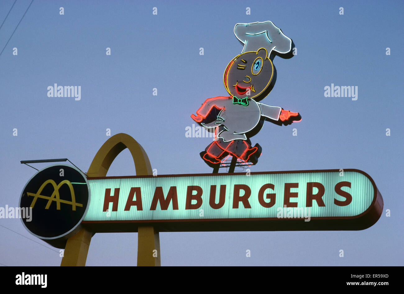 Neon sign for the oldest remaining original McDonald's which opened in 1953 featuring the Speedee mascot  in Downey, CA,, USA Stock Photo