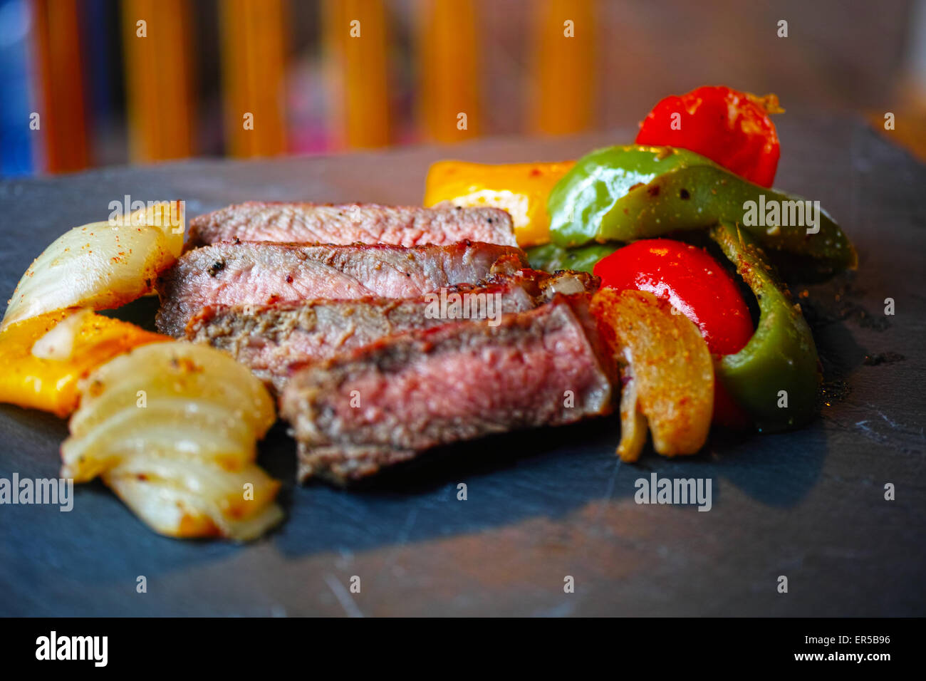 Grilled steak sliced with vegetables Stock Photo