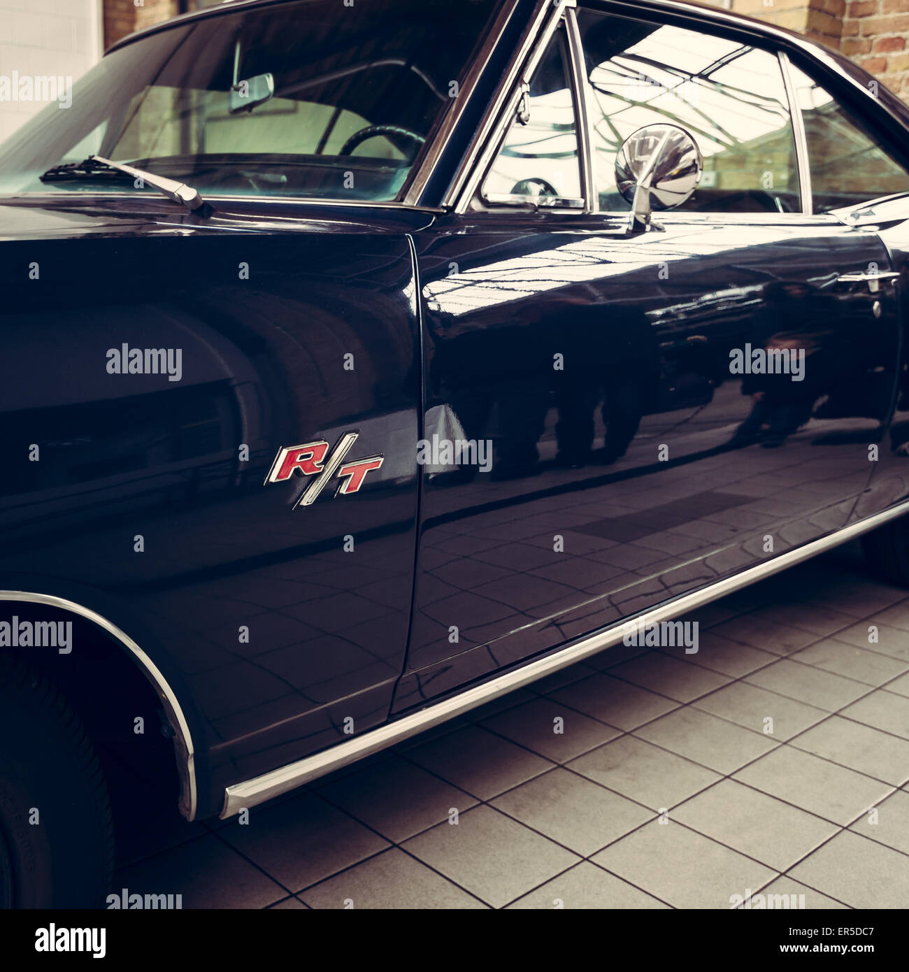 BERLIN - MAY 10, 2015: Fragment of the Dodge Charger RT. Vintage toning. Stylization. 28th Berlin-Brandenburg Oldtimer Day Stock Photo
