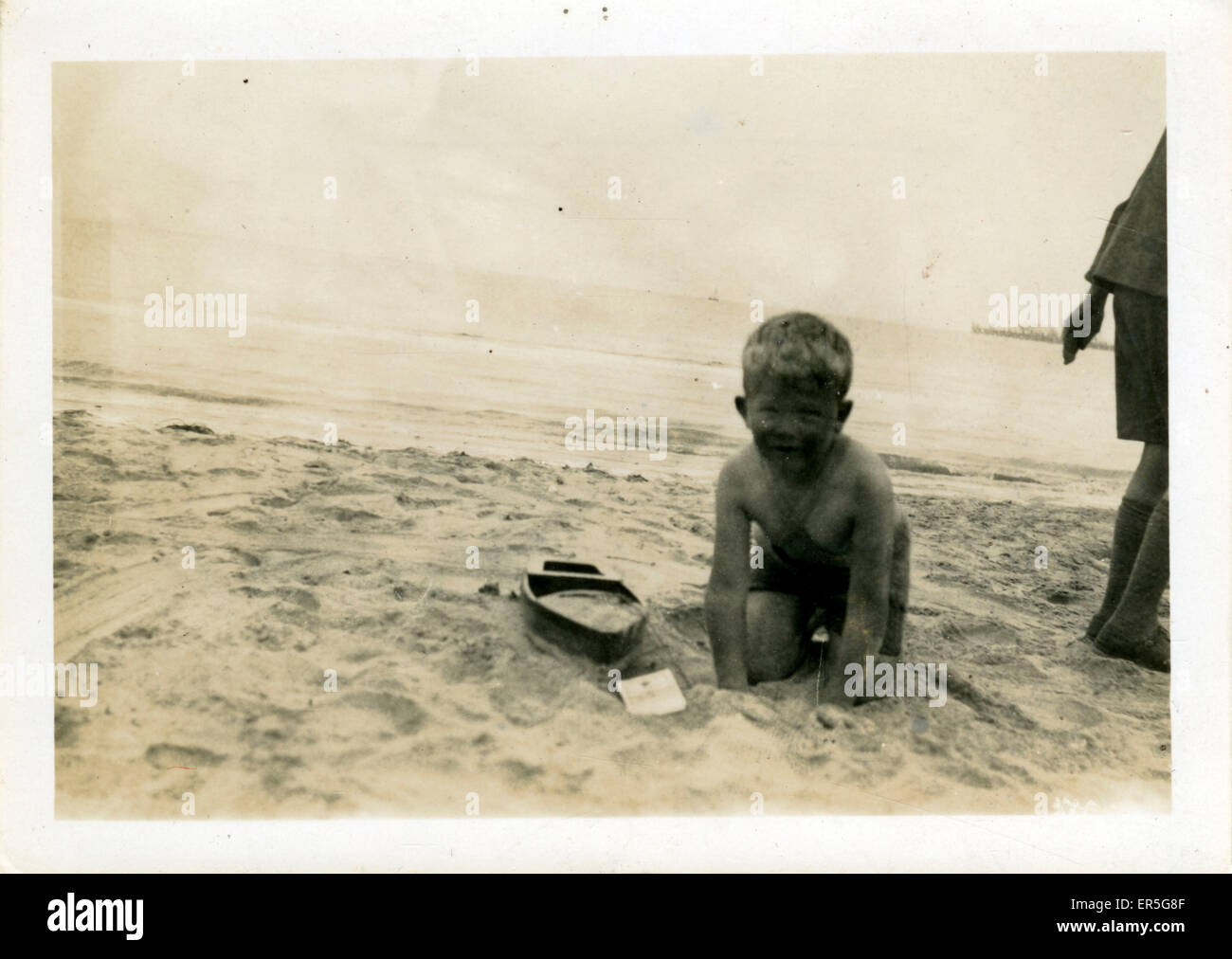 Child on the Beach, Weymouth, Dorset Stock Photo