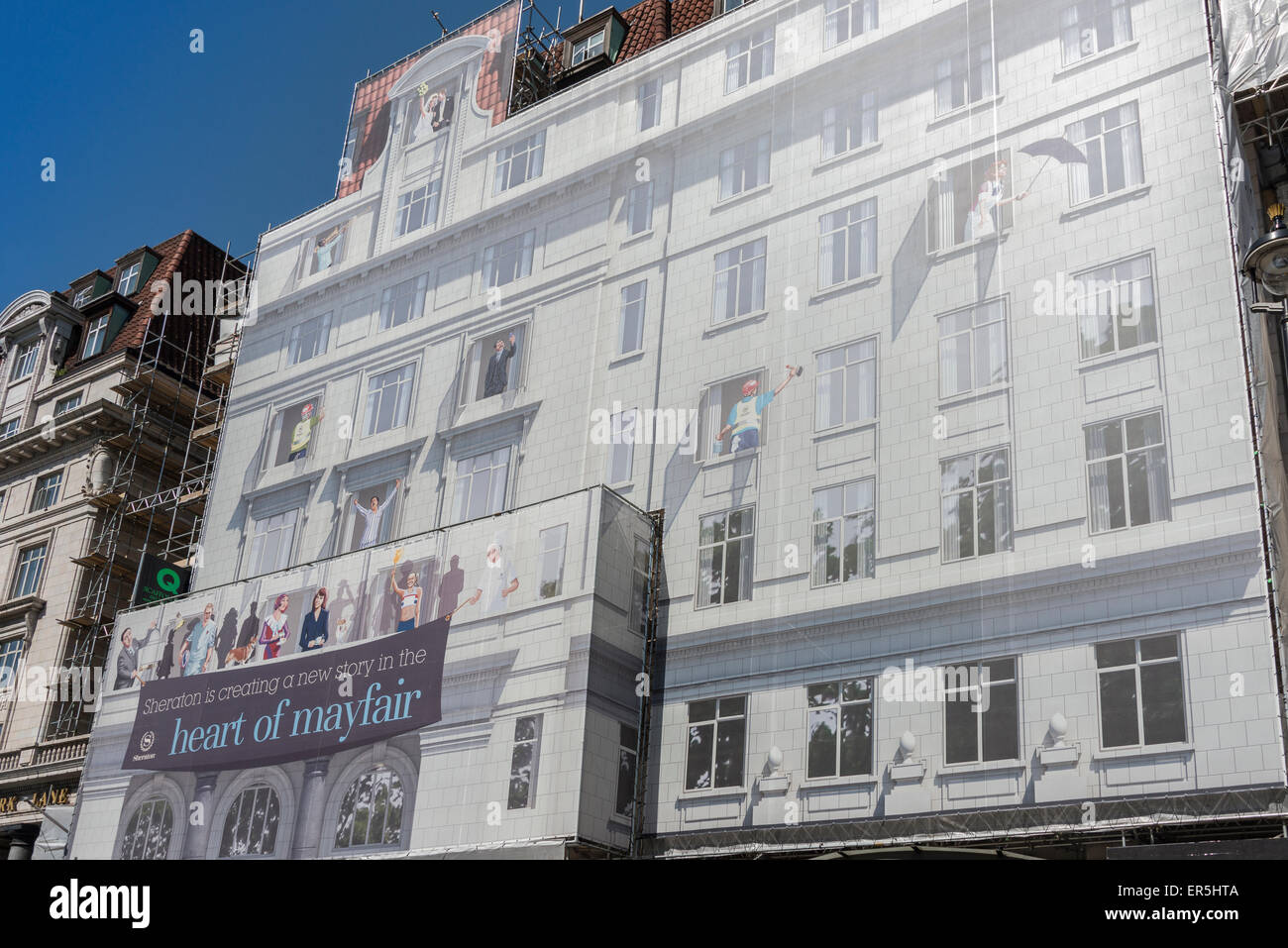 Scaffolding mural covering The Park Lane Hotel (Sheraton), Piccadilly, Mayfair, London, England, United Kingdom Stock Photo