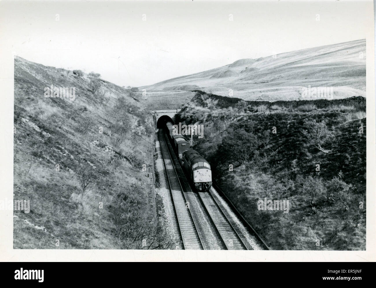 Settle-Carlisle Railway - Train emerging from Blea Moor Tunn Stock Photo