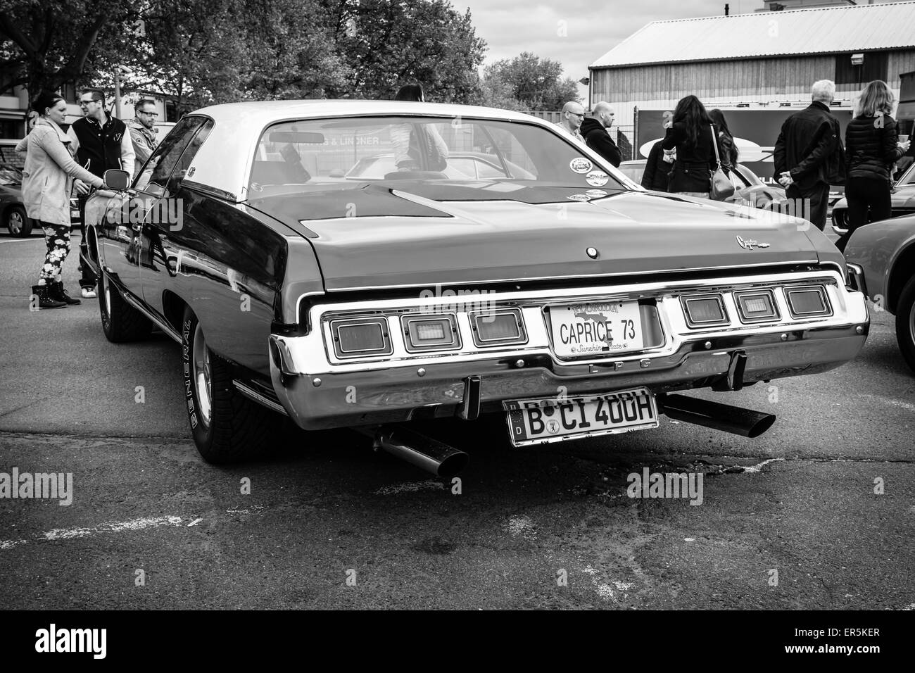 BERLIN - MAY 10, 2015: Full-size car Chevrolet Caprice, 1973. Black and white. Rear view. 28th Berlin-Brandenburg Oldtimer Day Stock Photo