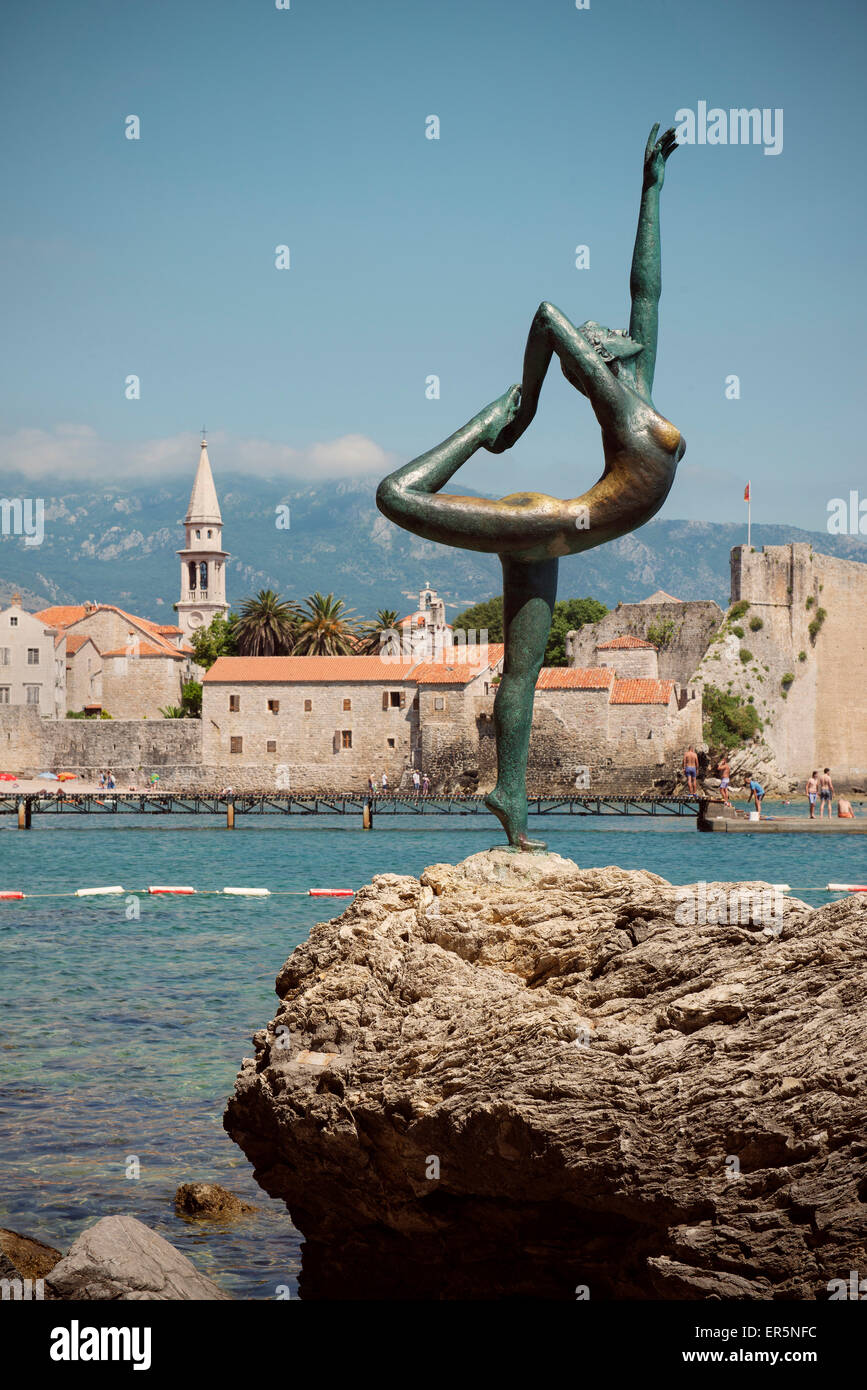 Sculpture of a nude female acrobat in front of old town of Budva, Stari  Grad, Adriatic coastline, Montenegro, Western Balkan, Eu Stock Photo - Alamy