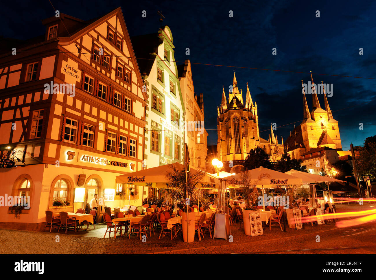 Restaurants at night with Erfurt Cathedral and Severi Church in the background, Cathedral Square, Erfurt, Thuringia, Germany Stock Photo