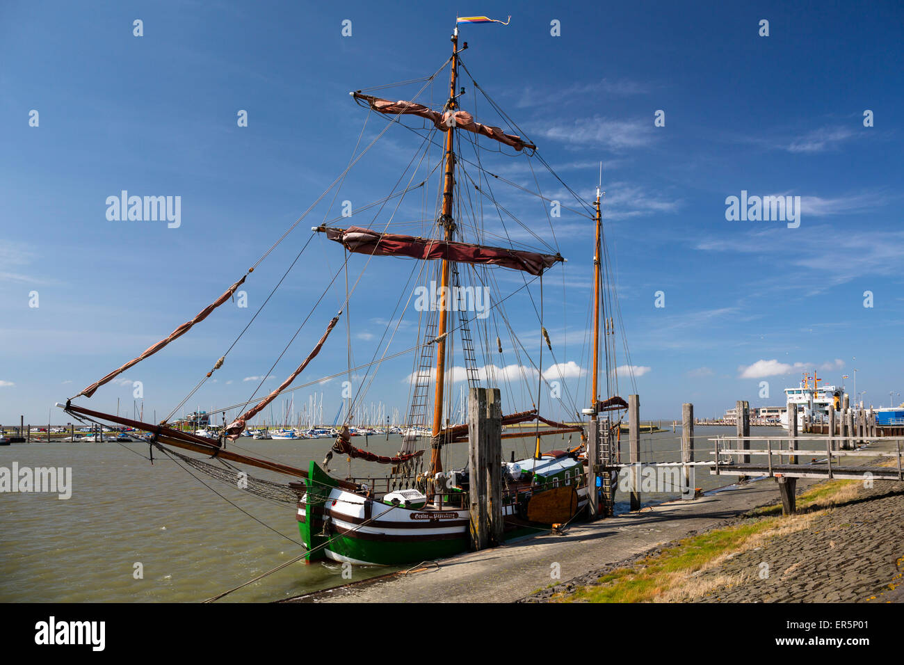 Old sailing boat in Norddeich harbour, Norden, Nationalpark, North Sea, East Frisian Islands, East Frisia, Lower Saxony, Germany Stock Photo