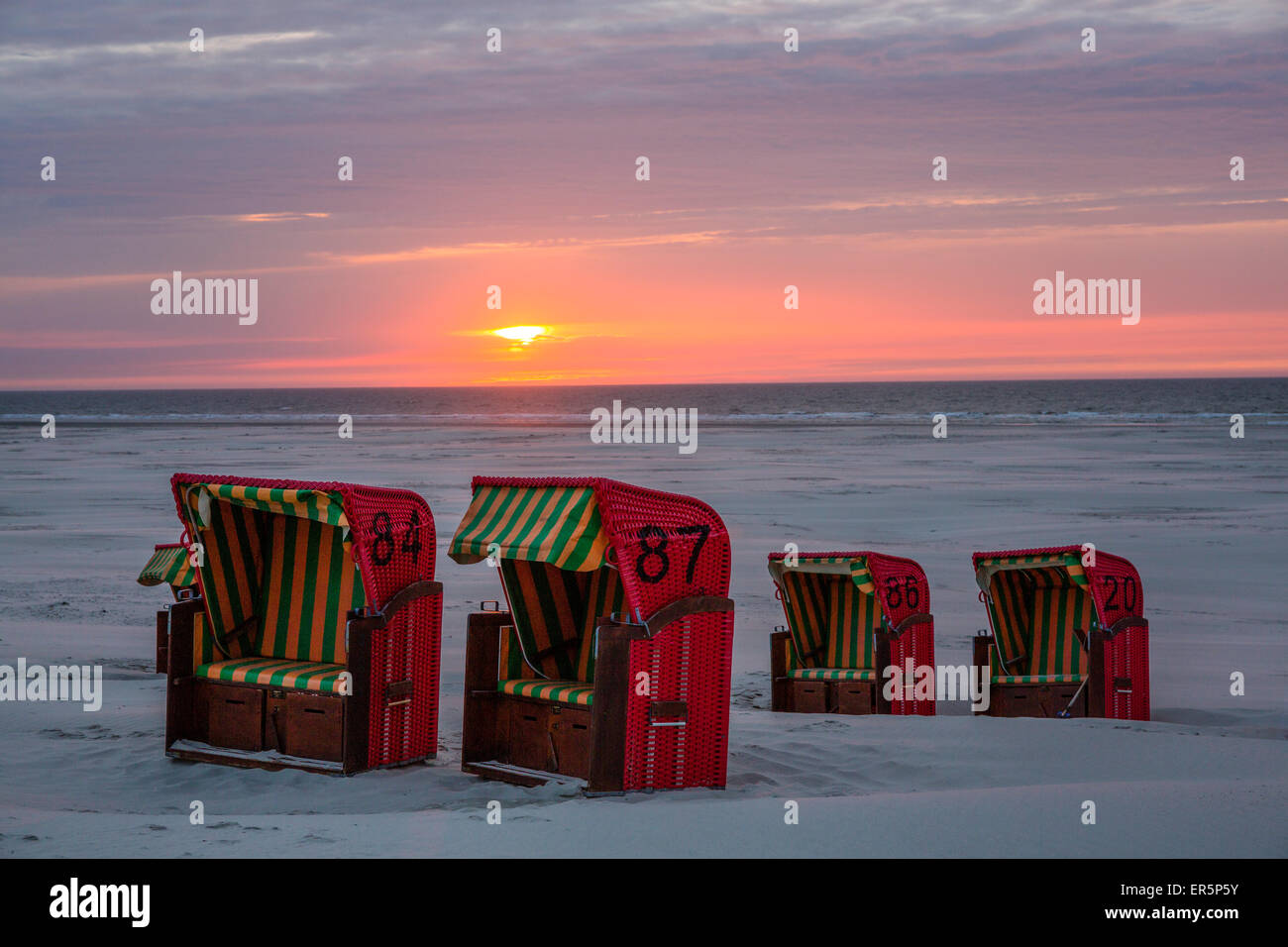 Beach and beach chairs at sunset, Juist Island, Nationalpark, North Sea, East Frisian Islands, East Frisia, Lower Saxony, German Stock Photo