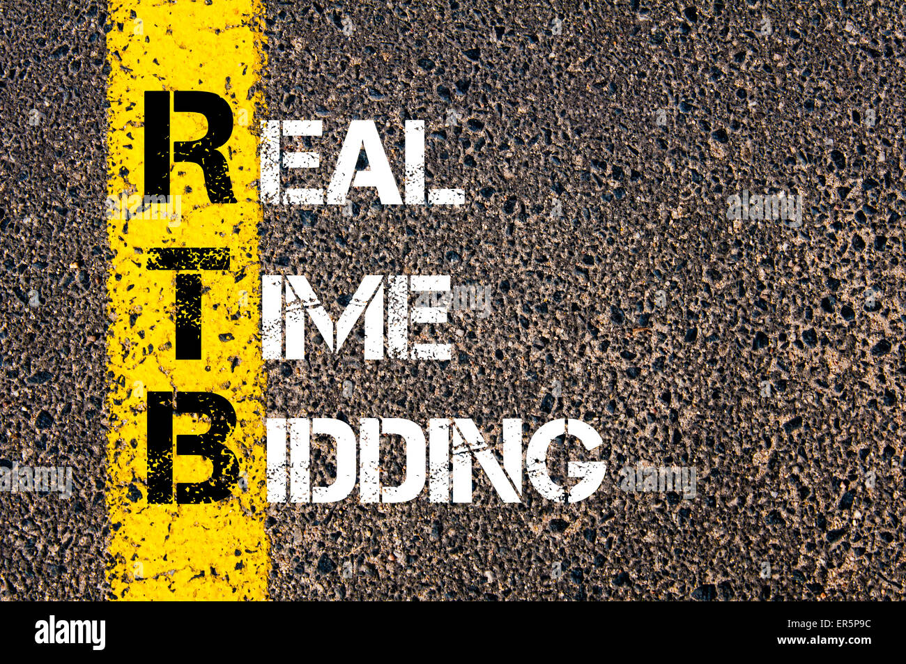 Concept image of Business Acronym RTB as REAL TIME BIDDING  written over road marking yellow paint line. Stock Photo