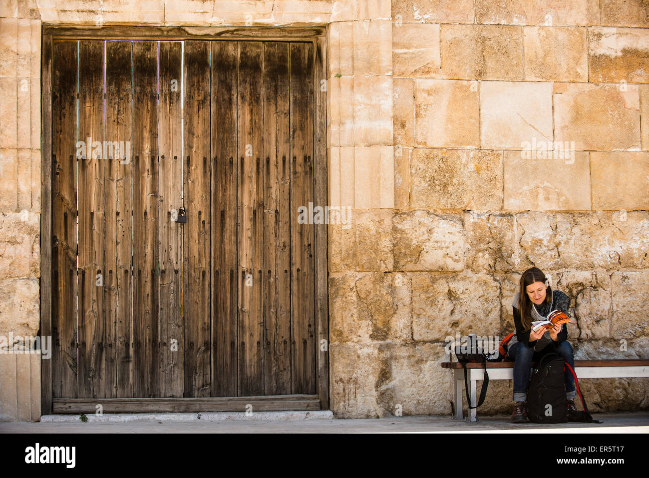 Woman reading a guidebook, Roman Theatre, Amman, Jordan, Middle East Stock Photo