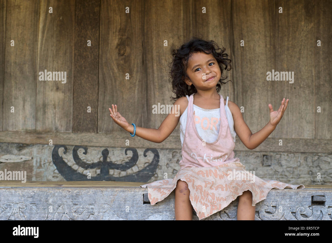 Young girl in Bena, a traditional Ngada village, Flores, Nusa Tenggara Timur, Lesser Sunda Islands, Indonesia, Asia Stock Photo