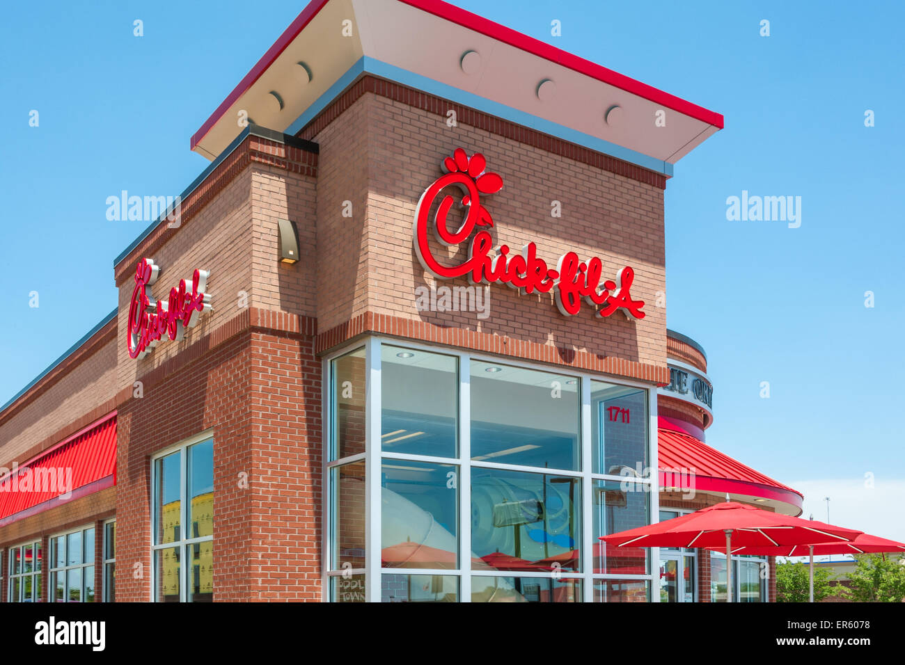 Chick-fil-A quick-serve restaurants are popular throughout America for excellent customer service and great chicken sandwiches. Stock Photo