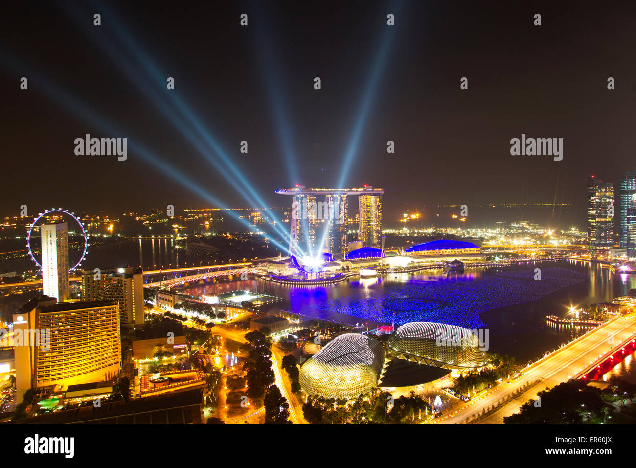 The Singapore skyline is illuminated for New year celebrations in the Marina Bay Central Business District (CBD) Stock Photo