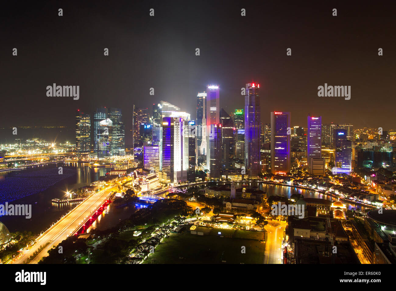 The Singapore skyline is illuminated for New year celebrations in the Marina Bay Central Business District (CBD) Stock Photo