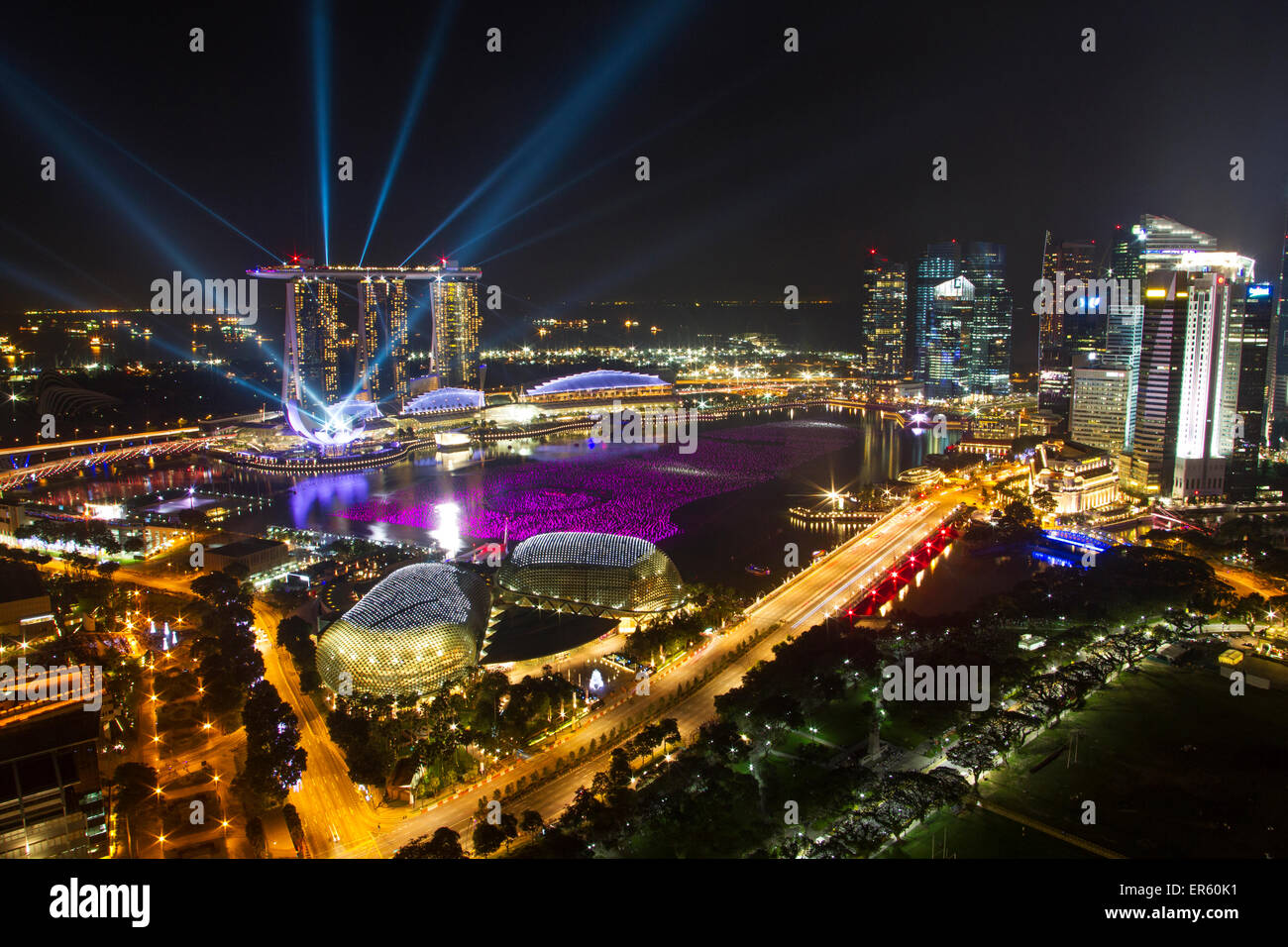 The Singapore skyline is illuminated for New year celebrations in the Marina Bay Central Business District (CBD) Stock Photo