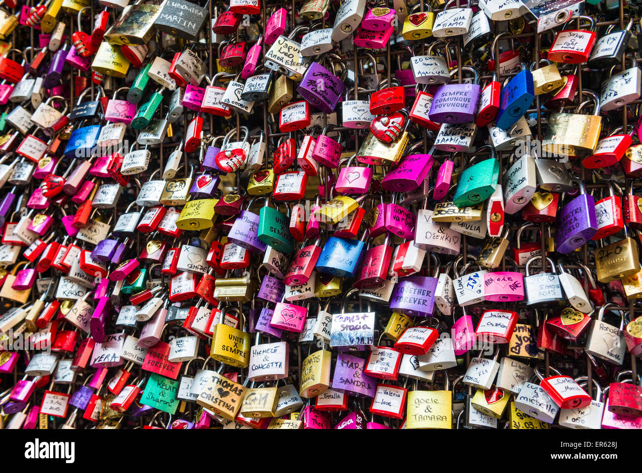 Many colourful love padlocks at the wall of Juliet's house, Verona, Verona, Italy Stock Photo