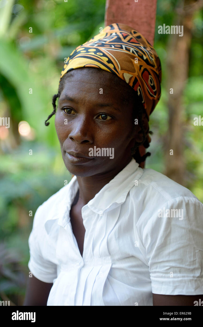 Woman with pensive expression, Riviere Froide, Ouest Department, Haiti