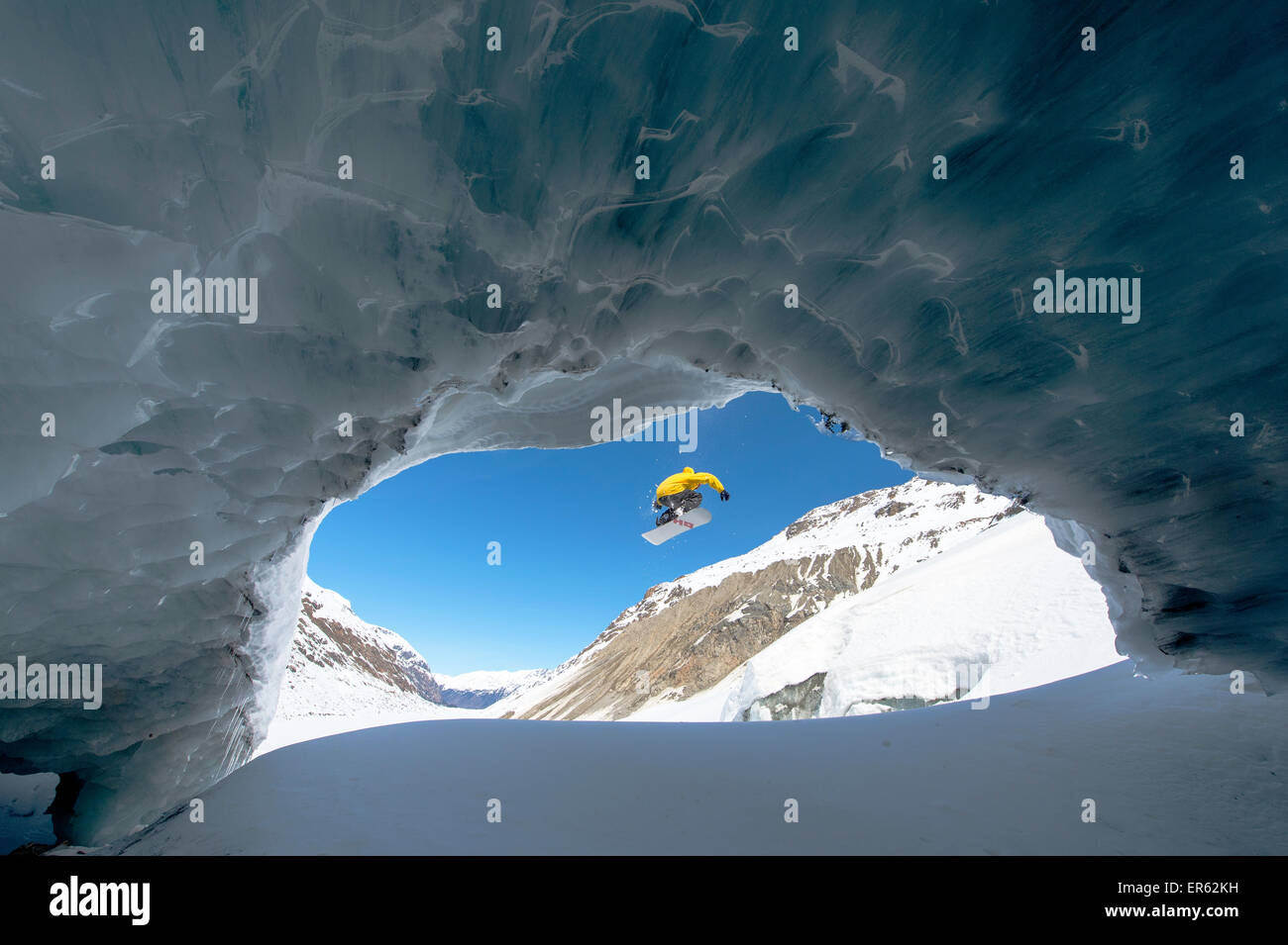 Snowboarding in the ice cave, Val Roseg, Pontresina, Canton of Graubünden, Switzerland Stock Photo