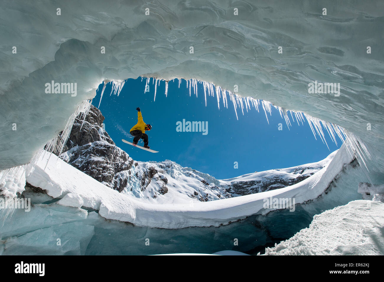 Snowboarding in the ice cave, Val Roseg, Pontresina, Canton of Graubünden, Switzerland Stock Photo