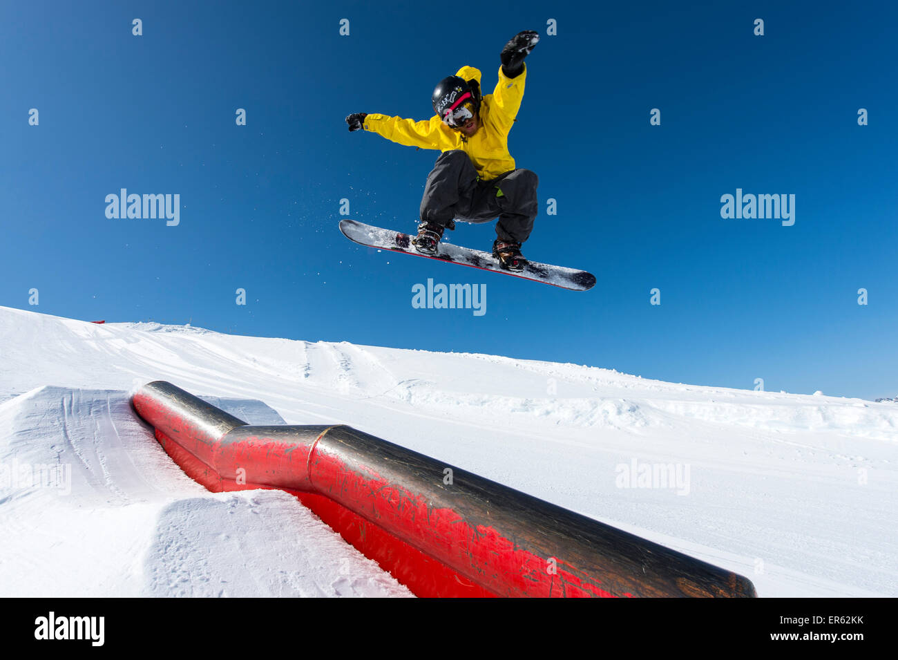 Snowboarder jumping in the park, Corvatsch, Silvaplana, Canton of Graubünden, Switzerland Stock Photo