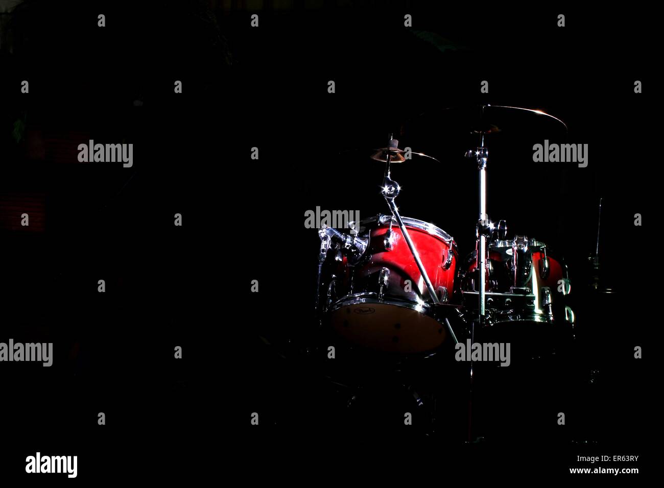 Red drum kit, black background Stock Photo