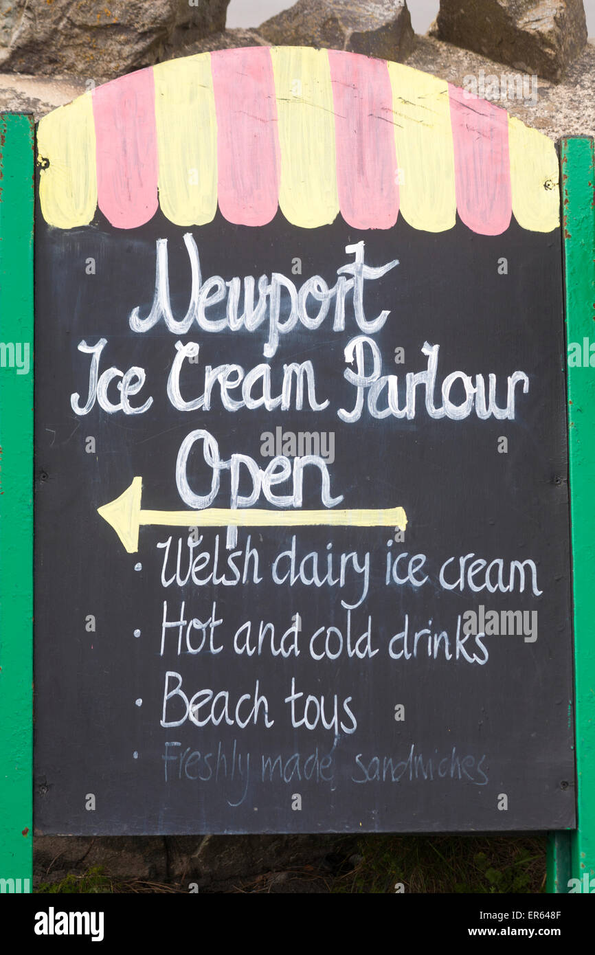 Newport Ice Cream Parlour open sign at Newport Sands Beach at