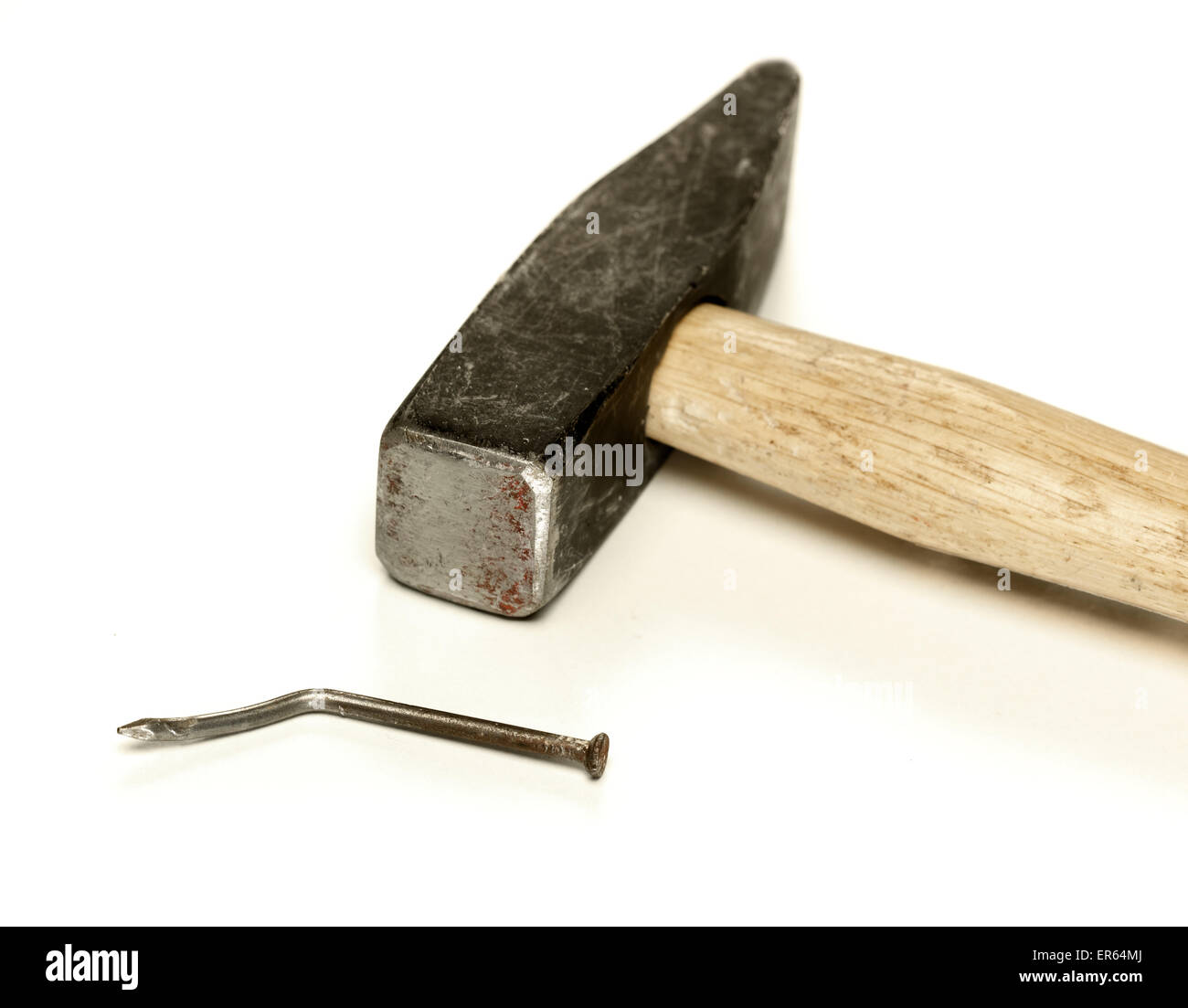 Failure to drive in a nail properly. Conceptual view of mistake Stock