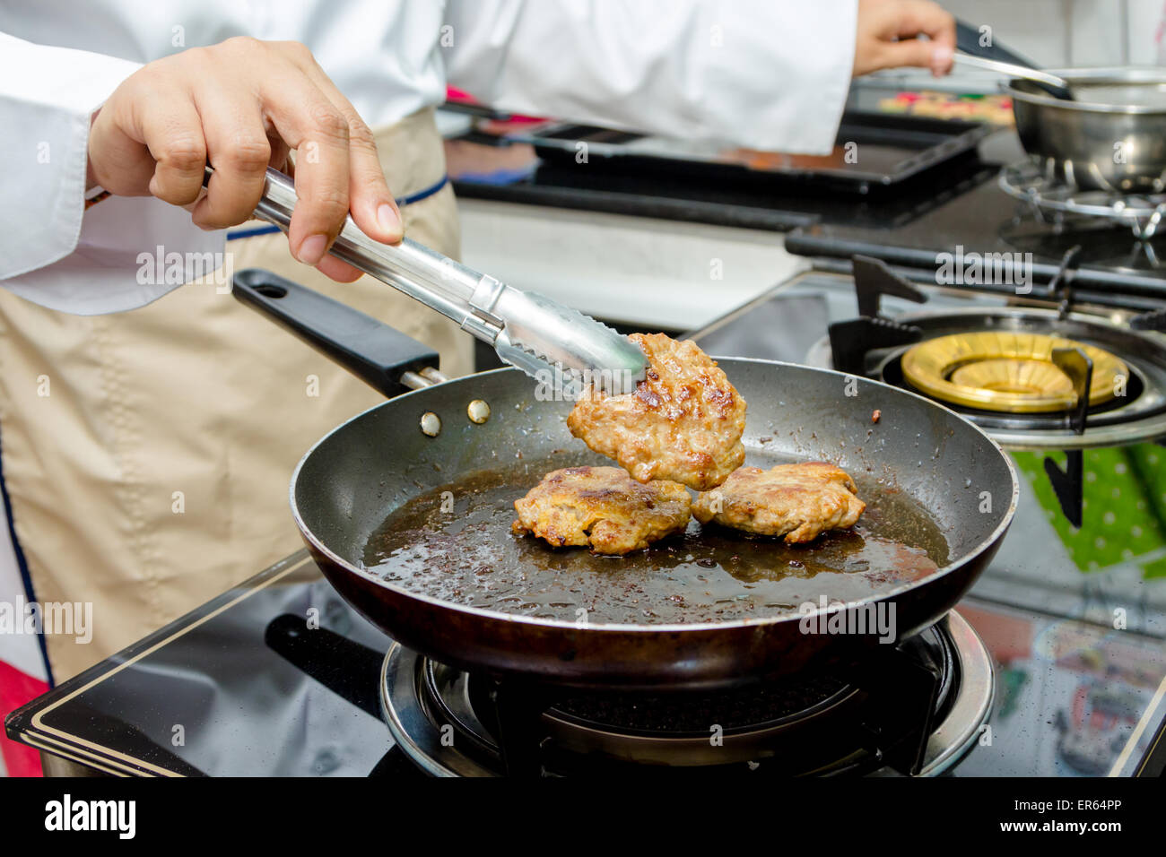 grill burger in pan Stock Photo Alamy